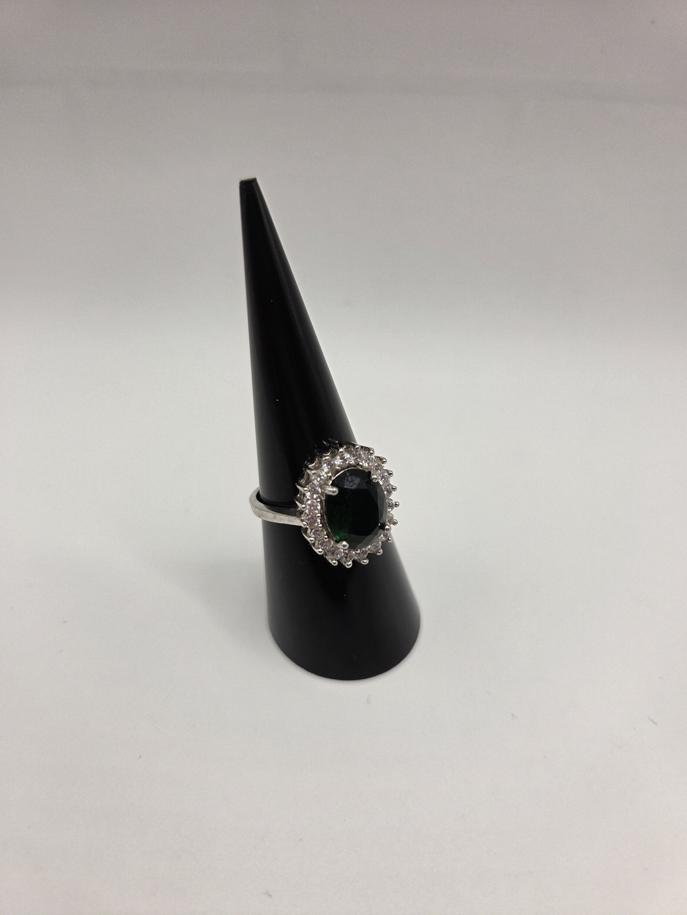 1722. Sterling Silver Halo Cocktail Ring with Deep Green Center
